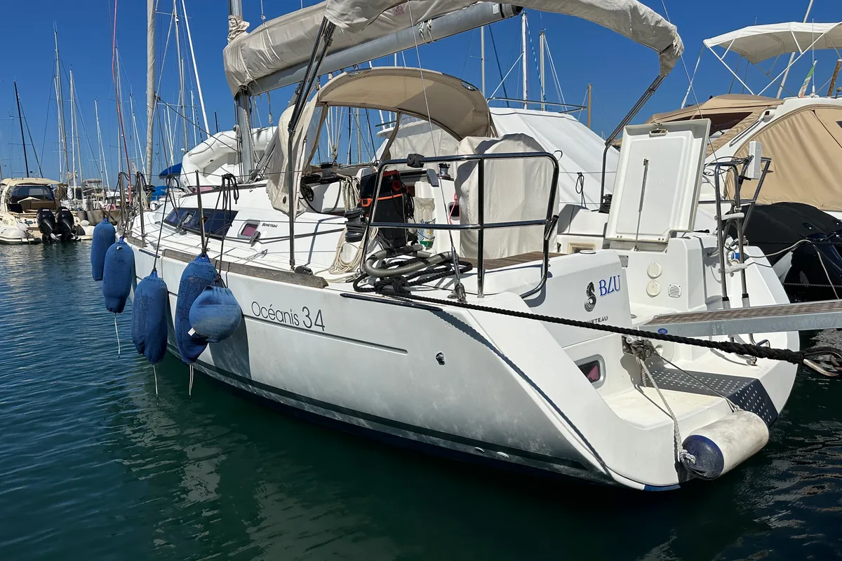 Exterior view of BLU, a Beneteau Oceanis 34 sailboat at Punta Ala, Italy
