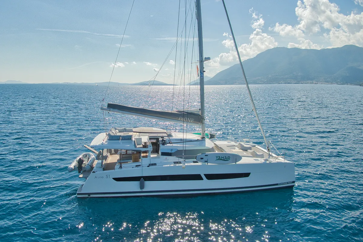 Exterior view of Dione II, a Fountaine Pajot Aura 51 catamaran at Municipal Unit of Lefkada, Greece