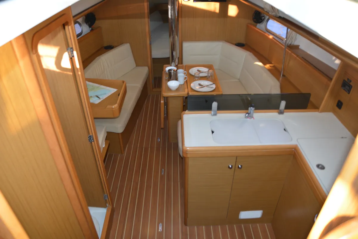 Salon of Babis 2010, a Jeanneau Sun Odyssey 36i sailboat at Municipal Unit of Lefkada, Greece