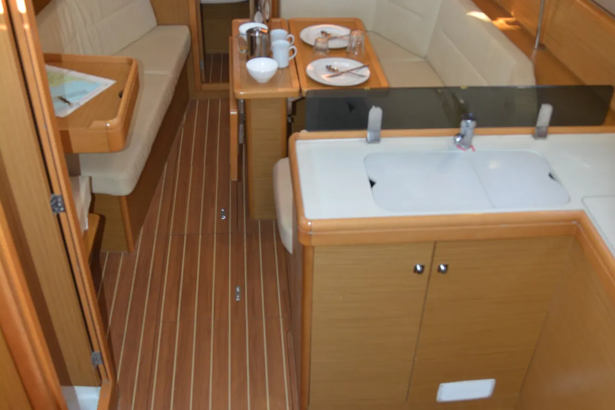 Salon of Babis 2010, a Jeanneau Sun Odyssey 36i sailboat at Municipal Unit of Lefkada, Greece