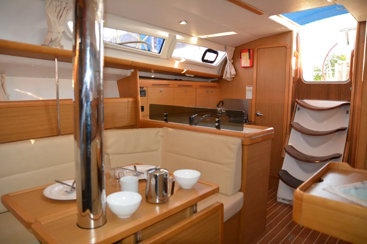 Salon of Babis 2010, a Jeanneau Sun Odyssey 36i sailboat at Municipal Unit of Lefkada, Greece