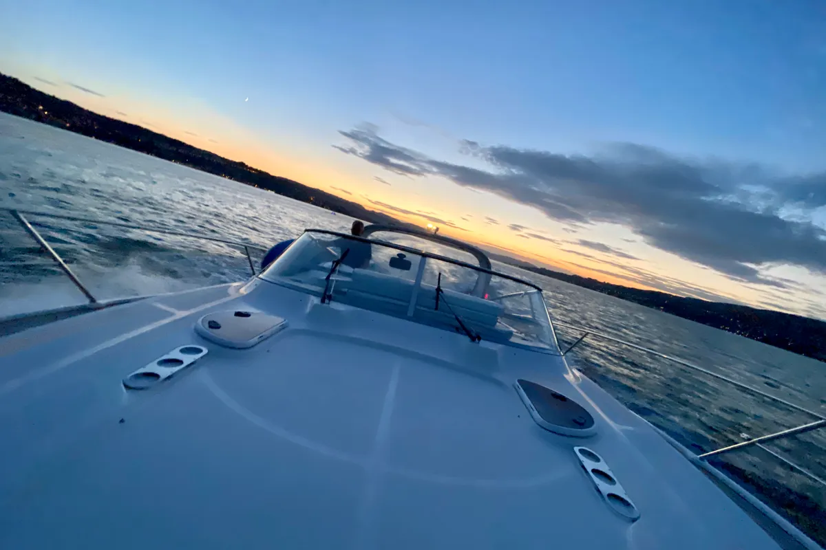 Exterior view of Ribelle, a Bavaria Sport 37 motorboat at Sant Antoni de Portmany, Spain