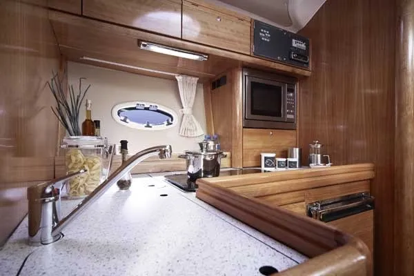 Galley of Ribelle, a Bavaria Sport 37 motorboat at Sant Antoni de Portmany, Spain