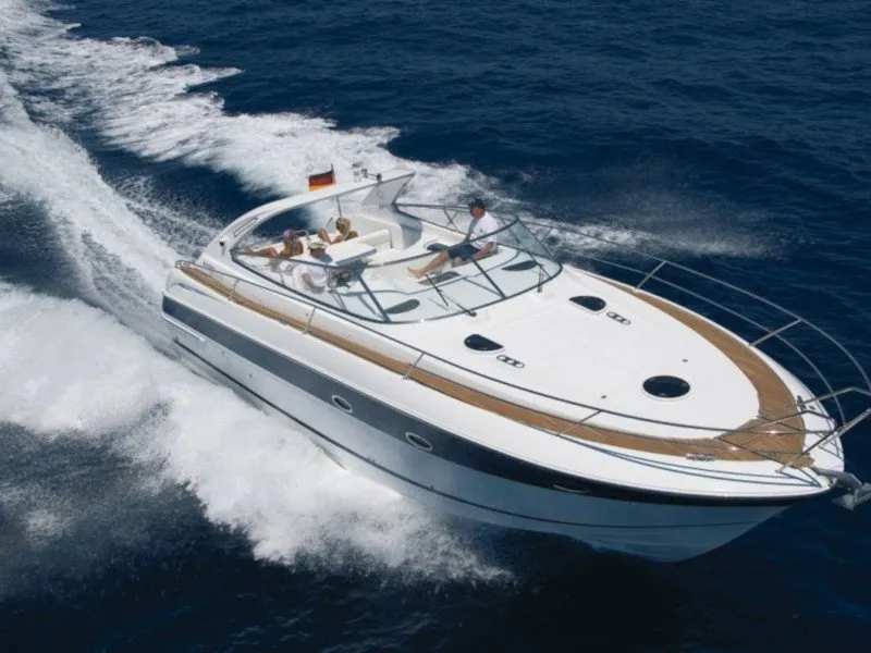 Exterior view of Ribelle, a Bavaria Sport 37 motorboat at Sant Antoni de Portmany, Spain