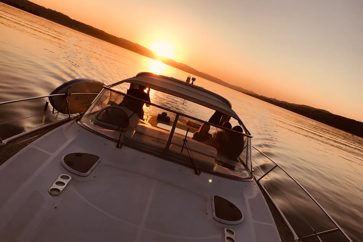 Exterior view of Ribelle, a Bavaria Sport 37 motorboat at Sant Antoni de Portmany, Spain