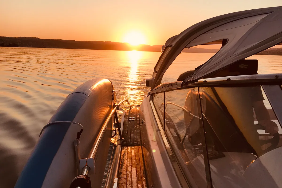 Exterior view of Ribelle, a Bavaria Sport 37 motorboat at Sant Antoni de Portmany, Spain