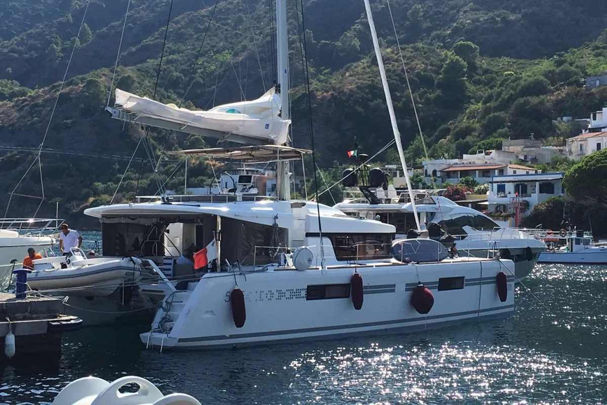 Exterior view of Summertime, a Lagoon 52F catamaran at Capo d'Orlando, Italy