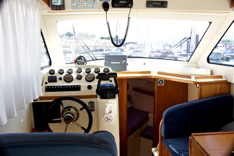 Cockpit of Txanpa Hiru, a Rodman 870 Fly motorboat at Vigo, Spain