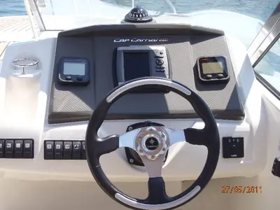 Cockpit of Cap Camarat, a Jeanneau Cap Camarat 7.5 CC motorboat at Sitges, Spain
