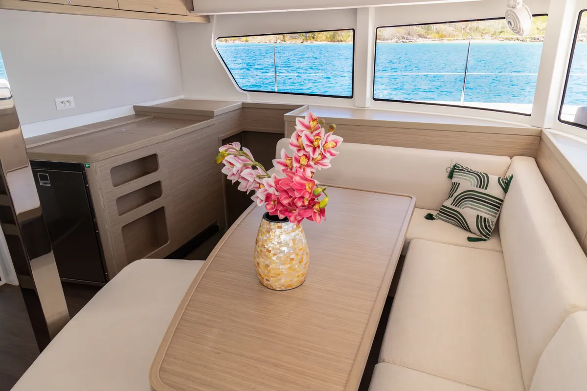 Salon of Athena Pearl, a Lagoon 42 catamaran at Roche Caiman, Seychelles