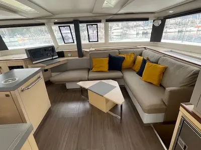 Salon of Red Rose, a Fountaine Pajot Saona 47 Quintet catamaran at Agios Stefanos, Greece