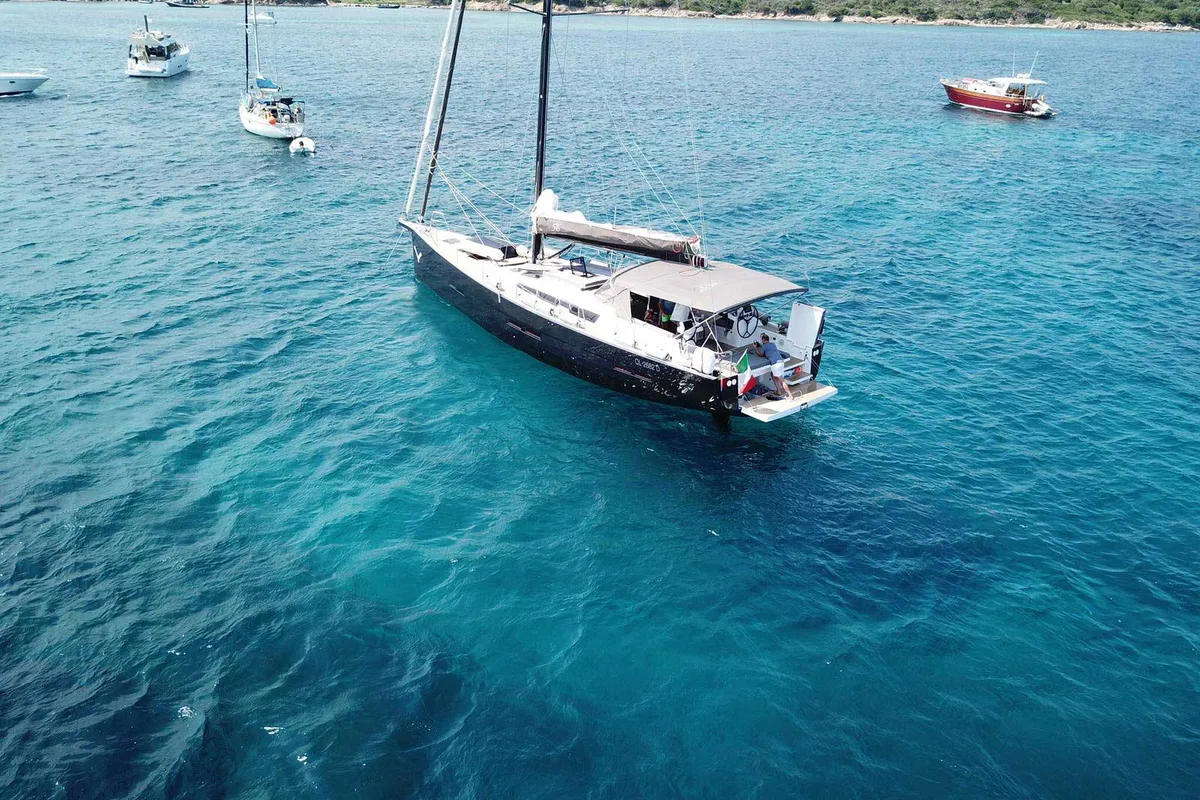 Exterior view of Hola, a Dufour 56 Exclusive sailboat at Olbia, Italy