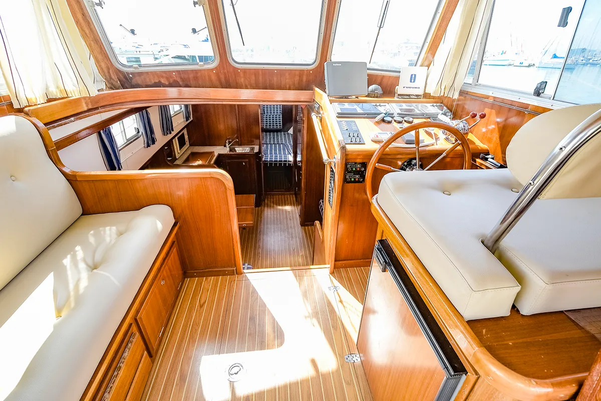 Cockpit of Mar De Coral, a Sasga Yachts Menorquin Yacht 100 motorboat at Sitges, Spain