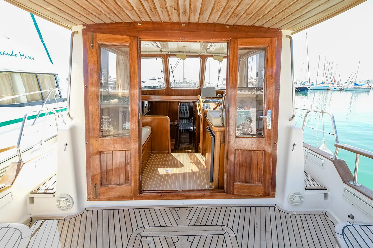 Deck of Mar De Coral, a Sasga Yachts Menorquin Yacht 100 motorboat at Sitges, Spain