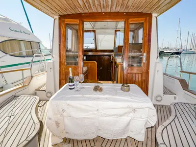 Deck of Mar De Coral, a Sasga Yachts Menorquin Yacht 100 motorboat at Sitges, Spain