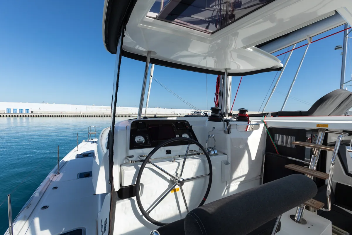 Cockpit of Nacatuli, a Lagoon 42 catamaran at Capo d'Orlando, Italy