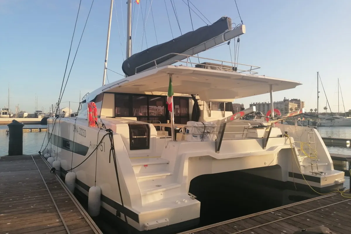 Exterior view of Papa Charlie, a Fountaine Pajot Aura 51 catamaran at Cannigione, Italy