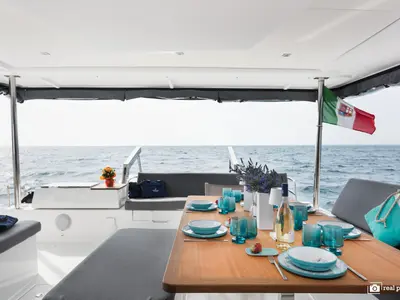 Deck of Papa Charlie, a Fountaine Pajot Aura 51 catamaran at Cannigione, Italy