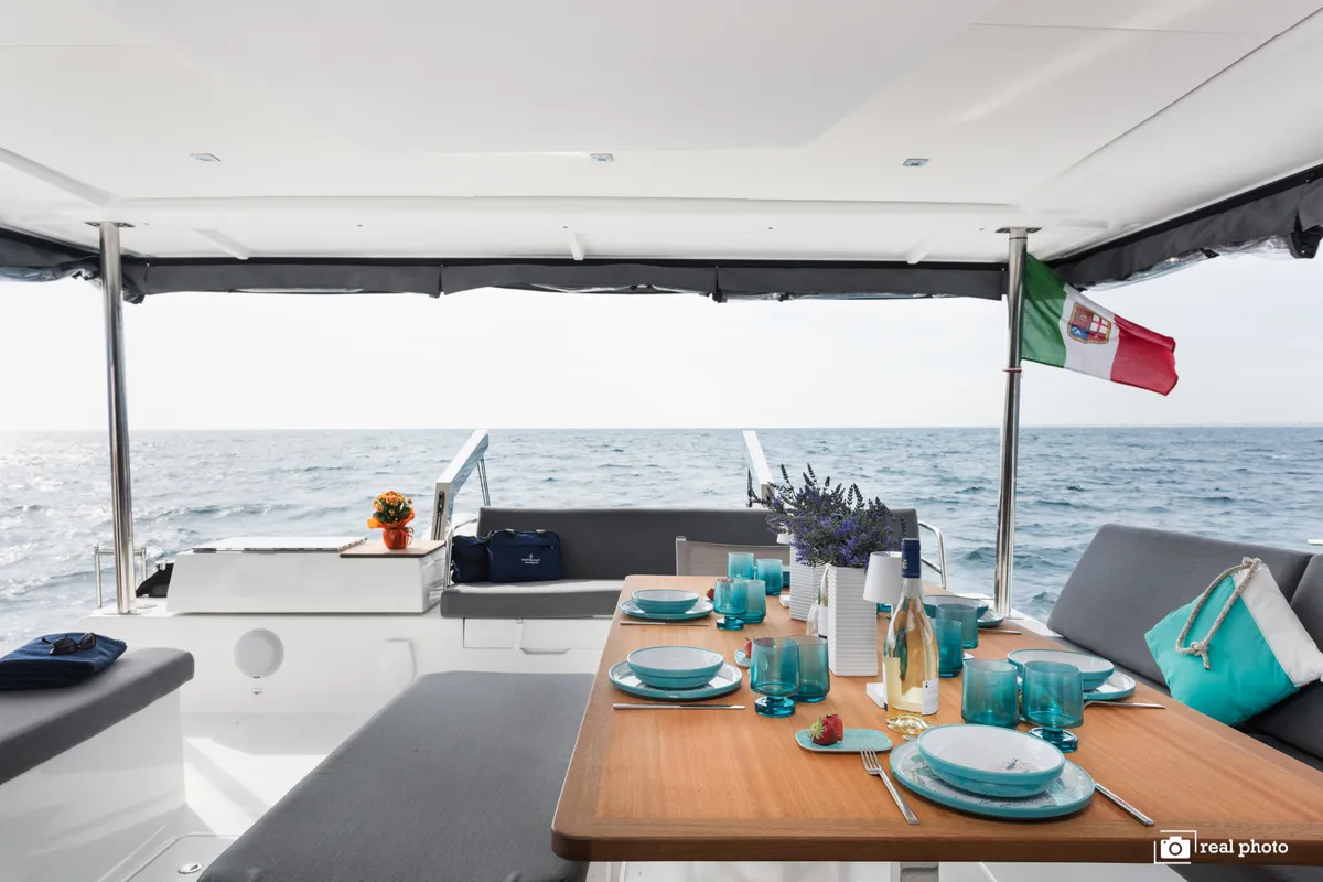 Deck of Papa Charlie, a Fountaine Pajot Aura 51 catamaran at Cannigione, Italy