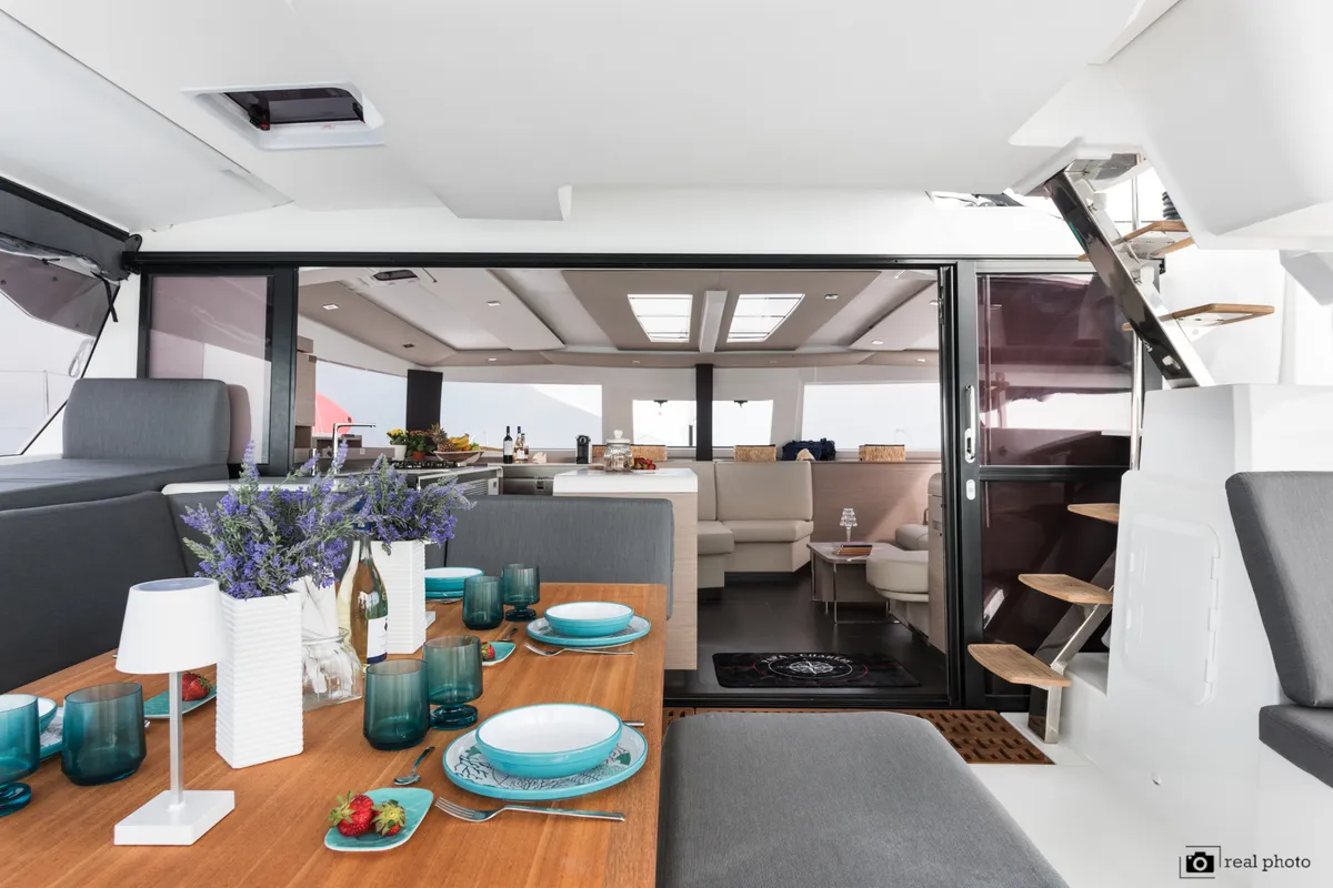Deck of Papa Charlie, a Fountaine Pajot Aura 51 catamaran at Cannigione, Italy