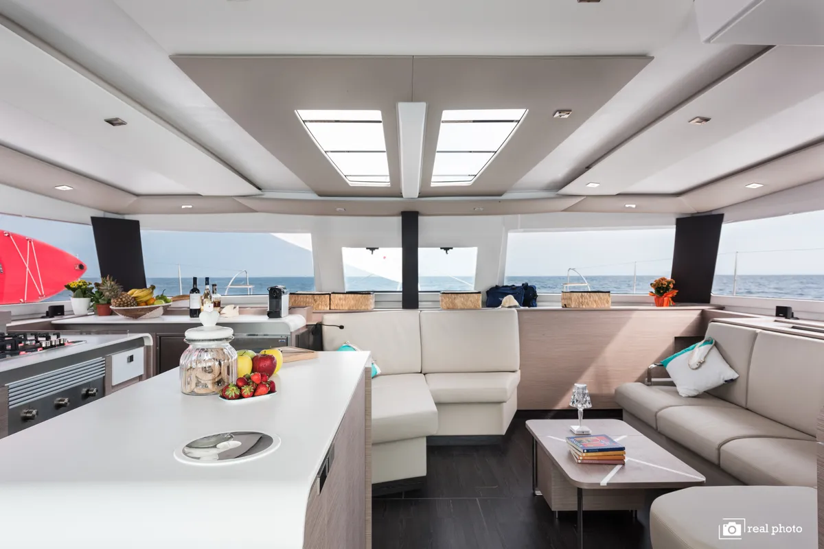 Salon of Papa Charlie, a Fountaine Pajot Aura 51 catamaran at Cannigione, Italy
