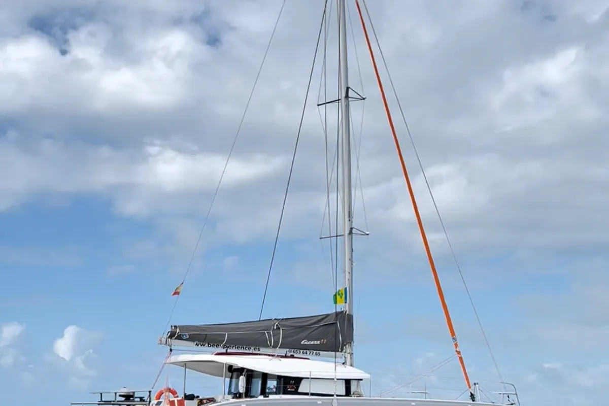 Exterior view of One Mallorca Crewed, a Excess 11 catamaran at Port d'Andratx, Spain