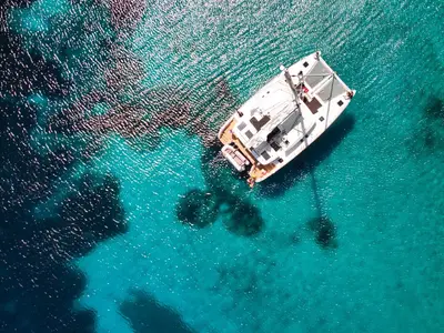 Exterior view of Pollo, a Lagoon 450 Fly catamaran at Lu Palau/Palau, Italy