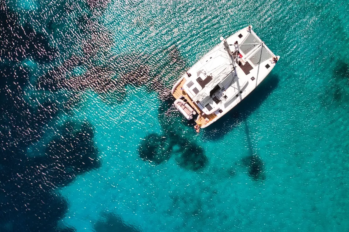 Exterior view of Pollo, a Lagoon 450 Fly catamaran at Lu Palau/Palau, Italy