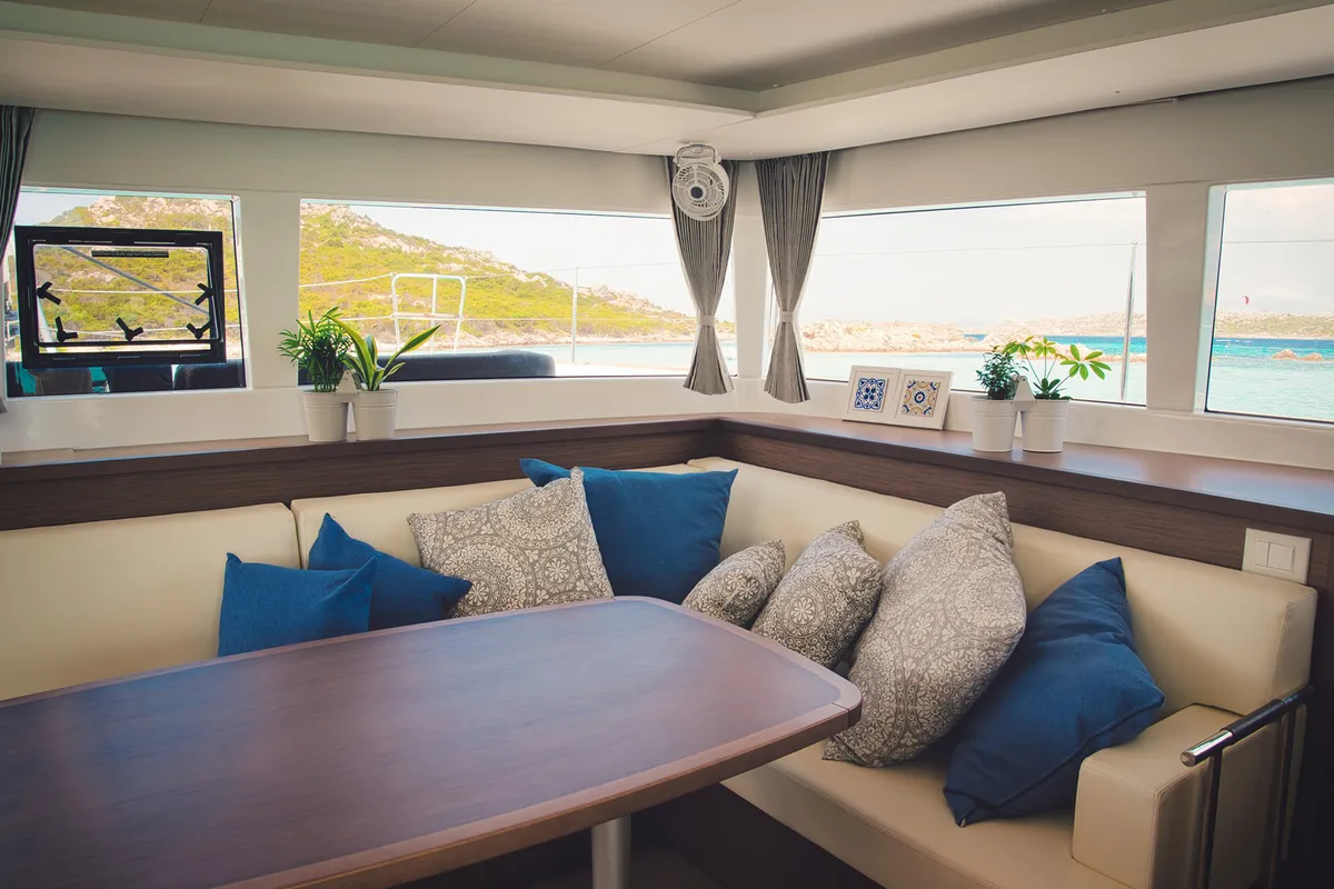Salon of Pollo, a Lagoon 450 Fly catamaran at Lu Palau/Palau, Italy