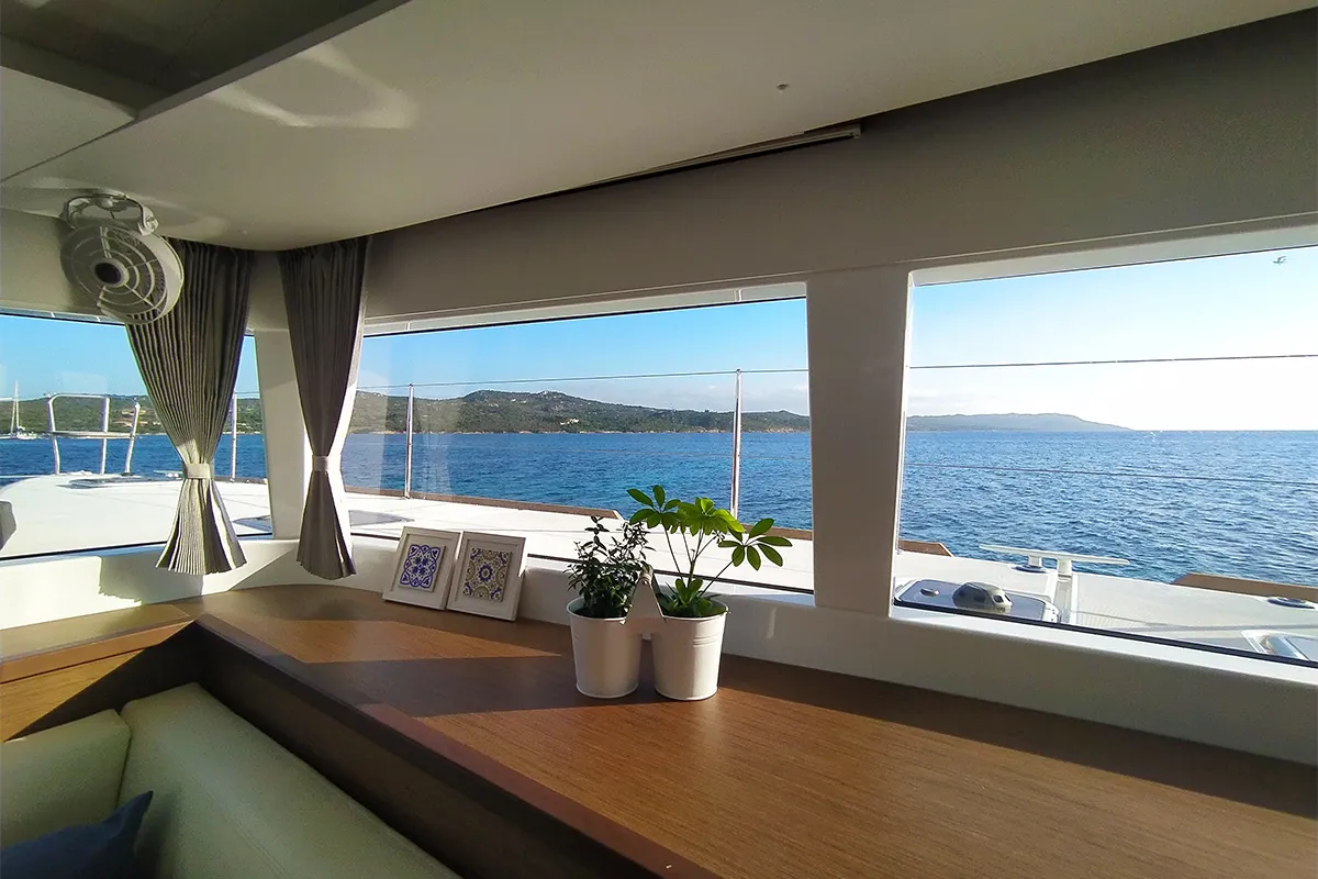 Salon of Pollo, a Lagoon 450 Fly catamaran at Lu Palau/Palau, Italy