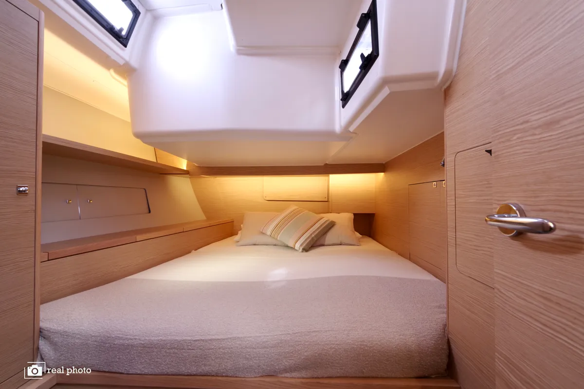 Cabin on Lucia, a Dufour 470 sailboat at Puntone di Scarlino, Italy