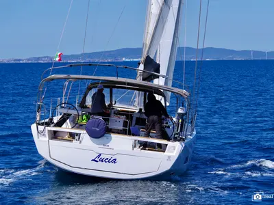 Exterior view of Lucia, a Dufour 470 sailboat at Puntone di Scarlino, Italy