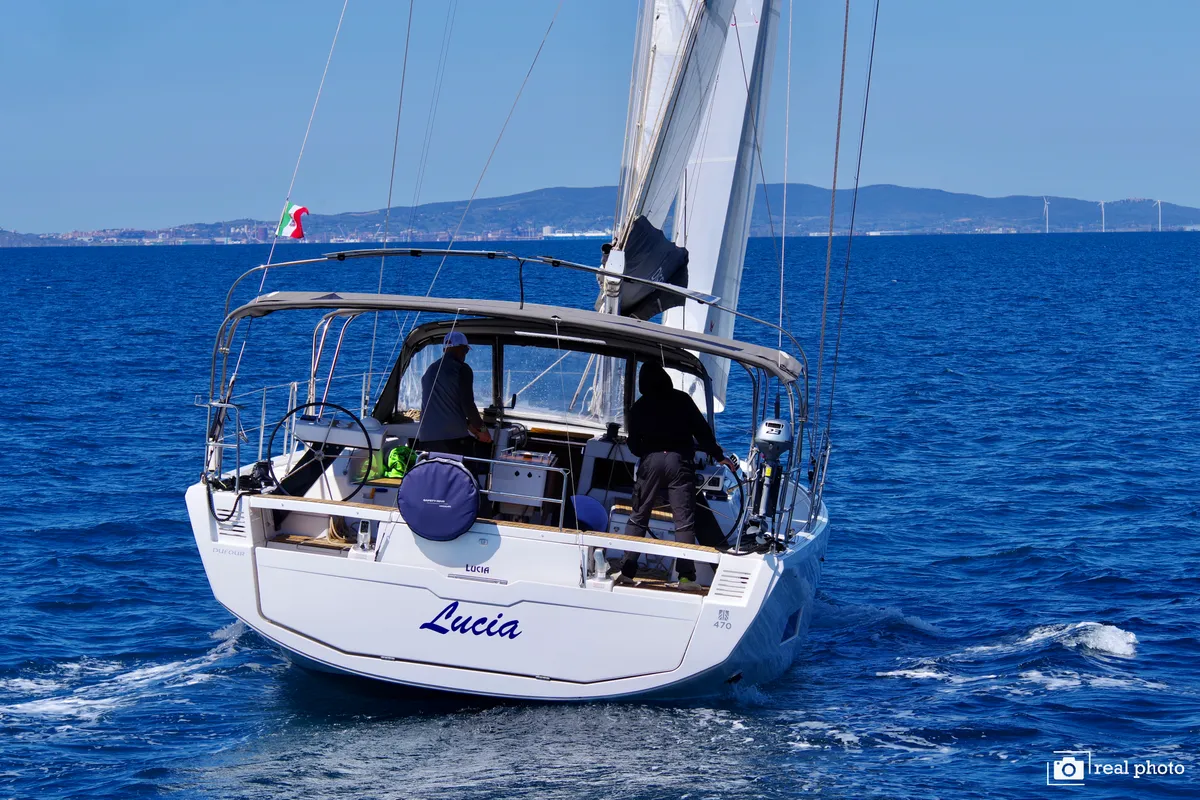 Exterior view of Lucia, a Dufour 470 sailboat at Puntone di Scarlino, Italy