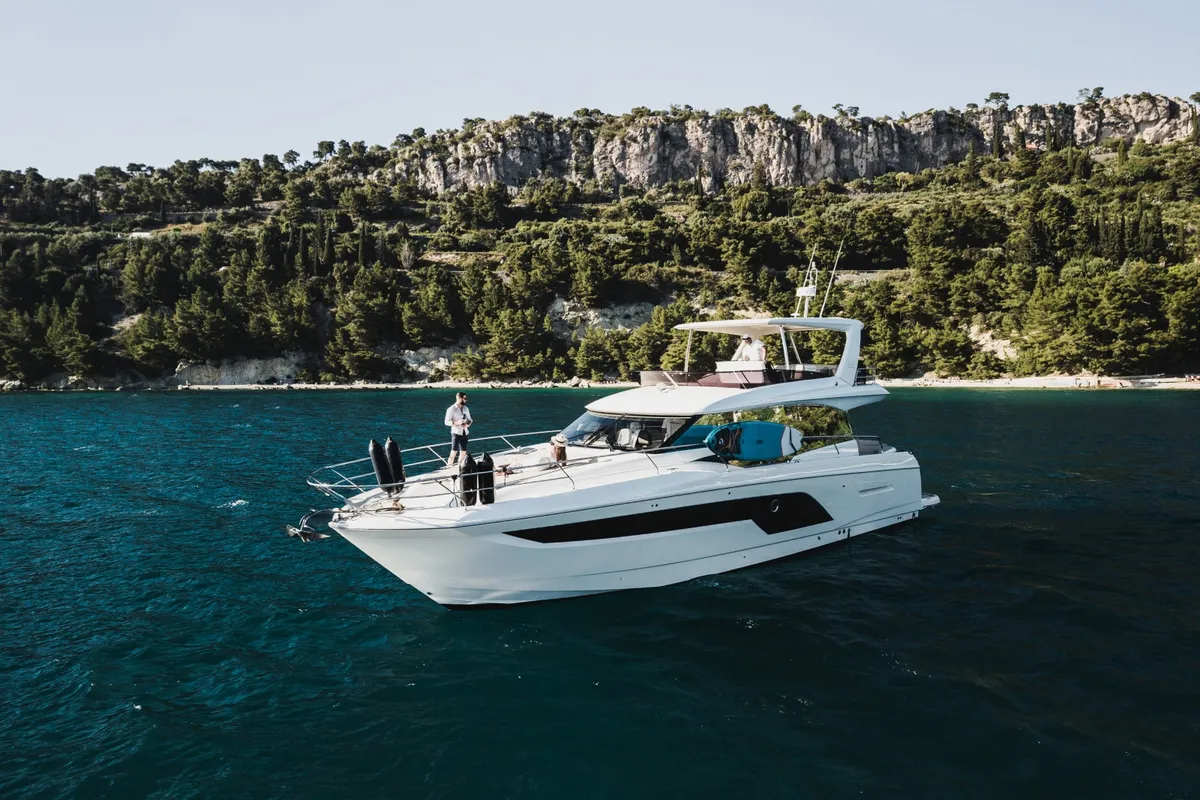 Exterior view of Shaft, a Jeanneau Prestige 590 Flybridge motor yacht at Podstrana - Miljevac, Croatia