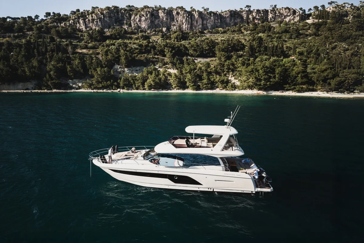 Exterior view of Shaft, a Jeanneau Prestige 590 Flybridge motor yacht at Podstrana - Miljevac, Croatia