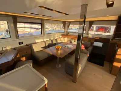 Salon of Les Jumeaux, a Lagoon 46 OW catamaran at Ventimiglia, Italy