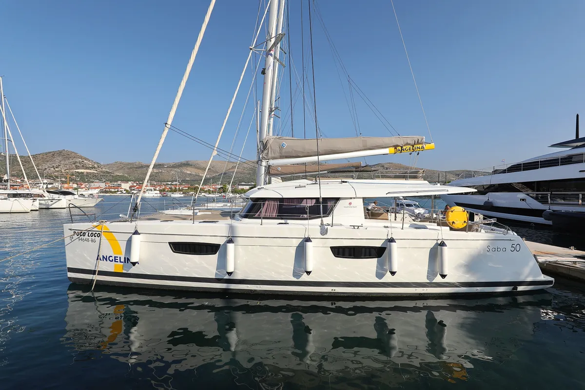Exterior view of Poco Loco, a Fountaine Pajot Saba 50 catamaran at Grad Trogir, Croatia