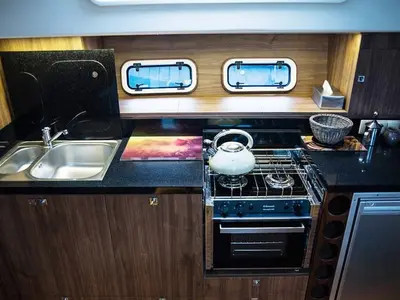 Galley of Delphia Yachts Nautika 1300, a motor yacht at Wilkasy, Poland