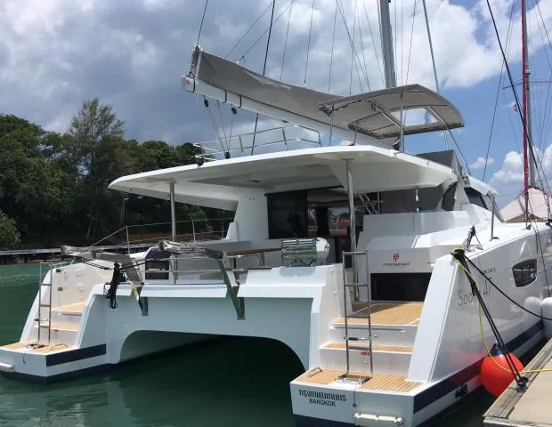 Exterior view of Lola 2, a Fountaine Pajot Saona 47 catamaran at Mai Khao, Thailand