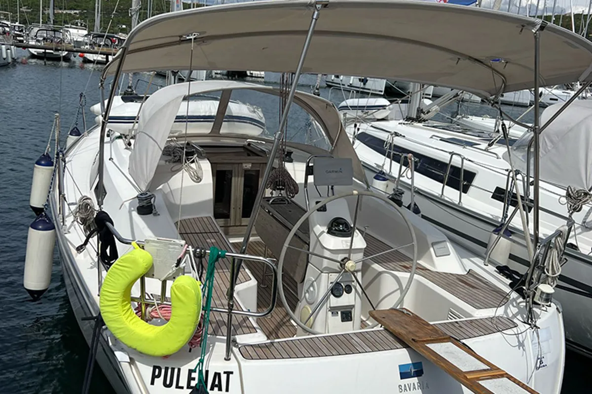 Exterior view of Pulenat, a Bavaria Cruiser 33 sailboat at Punat, Croatia