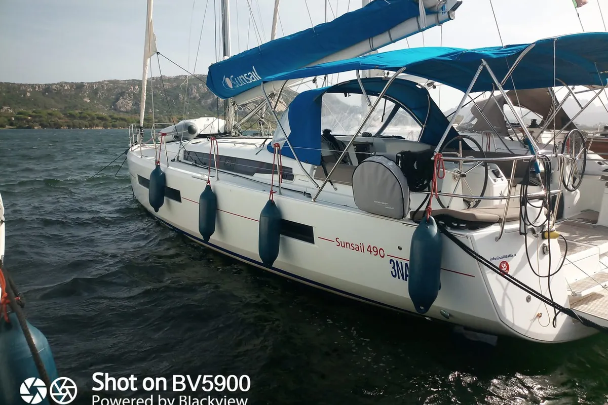 Exterior view of Agatha, a Jeanneau Sun Odyssey 490 sailboat at Cannigione, Italy