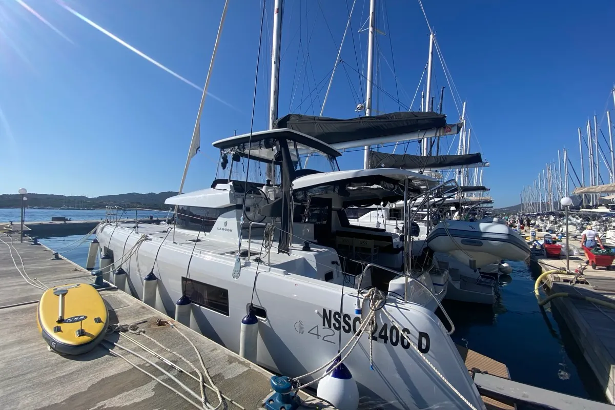 Exterior view of Copernicus II, a Lagoon 42 catamaran at Olbia, Italy