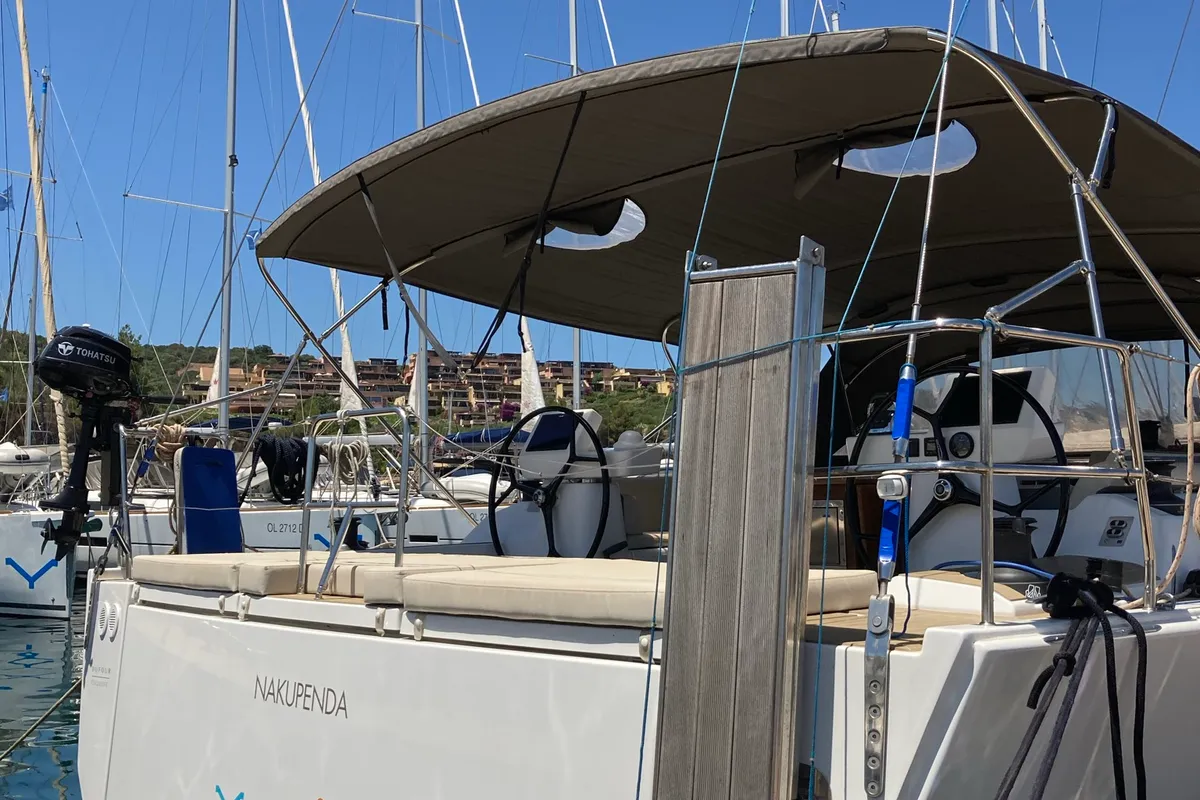 Exterior view of Nakupenda, a Dufour 56 Exclusive sailboat at Olbia, Italy
