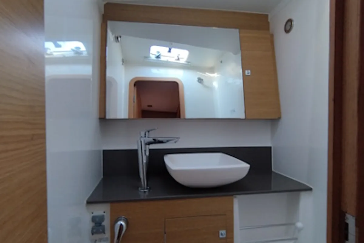 Head on Nakupenda, a Dufour 56 Exclusive sailboat at Olbia, Italy