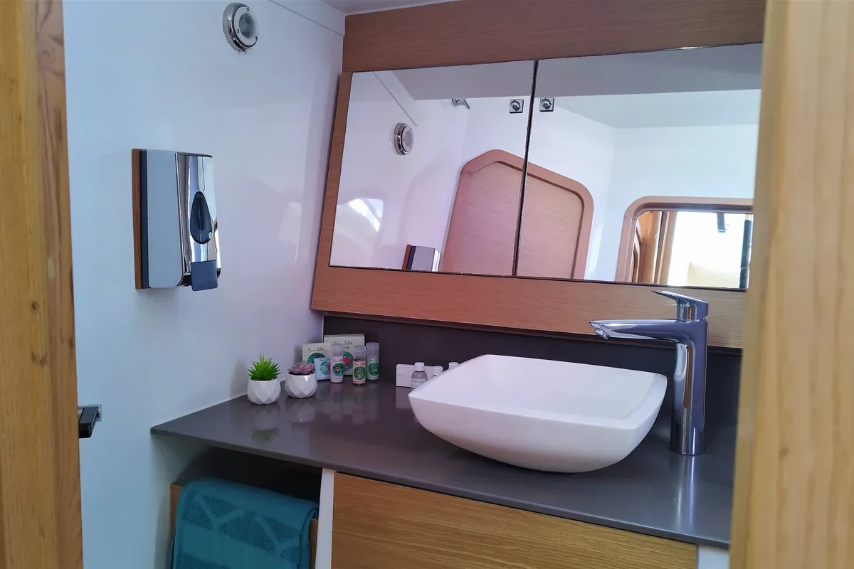 Head on Nakupenda, a Dufour 56 Exclusive sailboat at Olbia, Italy