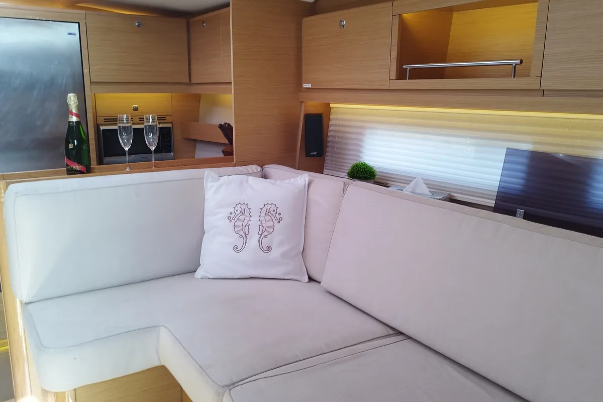 Salon of Nakupenda, a Dufour 56 Exclusive sailboat at Olbia, Italy