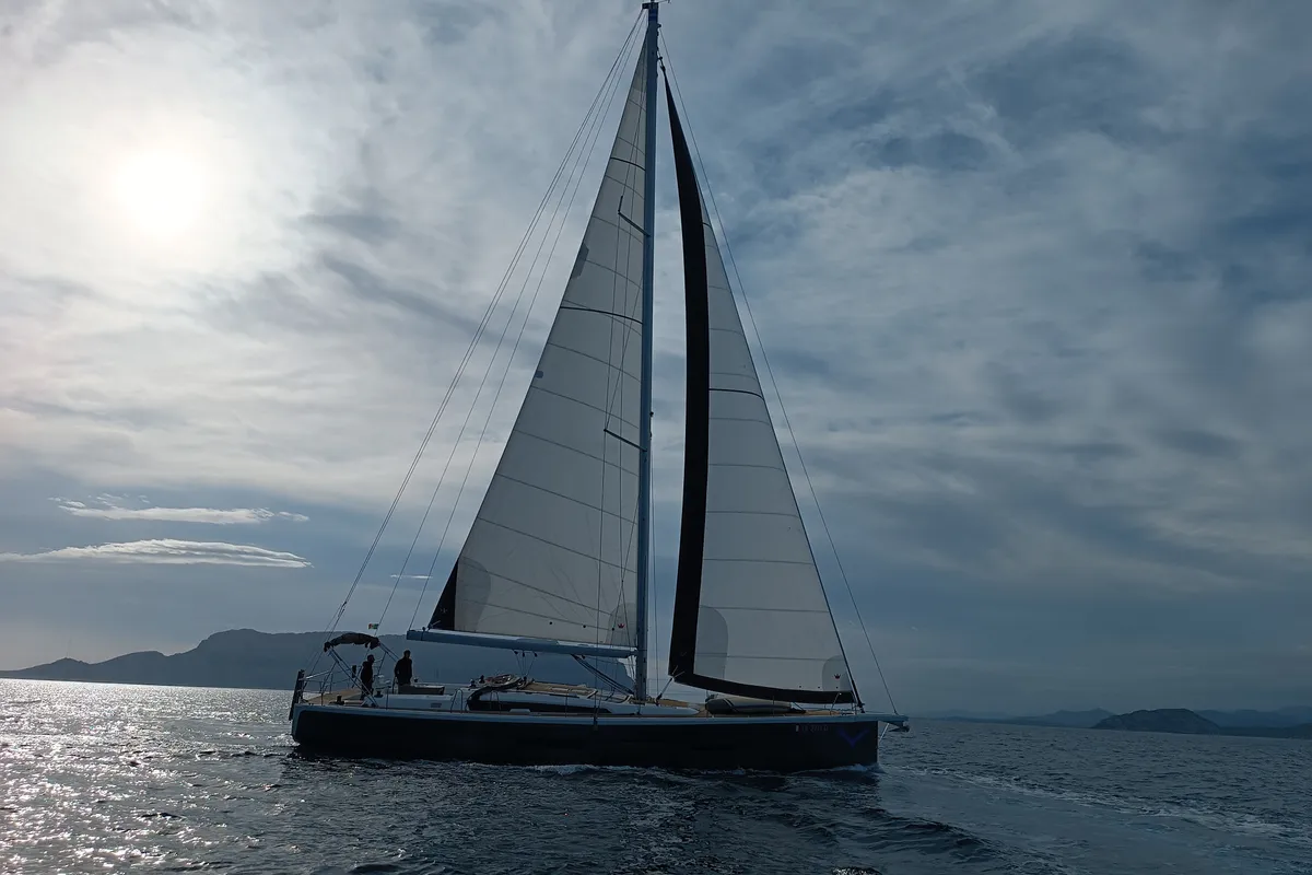 Exterior view of Nakupenda, a Dufour 56 Exclusive sailboat at Olbia, Italy