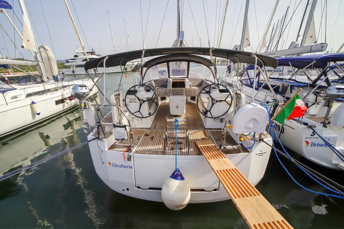 Exterior view of Eleutheria, a Jeanneau 54 sailboat at Olbia, Italy