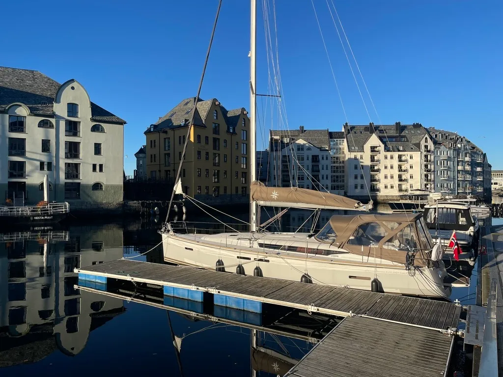 Exterior view of Petrine II, a Jeanneau Sun Odyssey 439 sailboat at Mauseidvågen, Norway