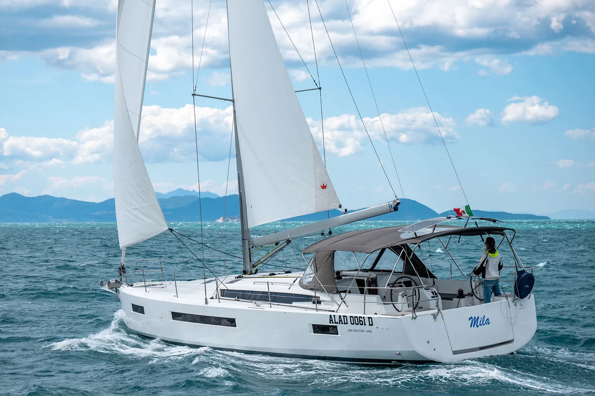 Mila, a Jeanneau Sun Odyssey 490 sailboat at Puntone di Scarlino, Italy